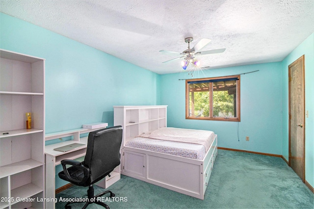 12829 Silver Ridge Dr, Grand Ledge, MI 48837 - bedroom featuring light carpet, an office area, a textured ceiling, and a ceiling fan