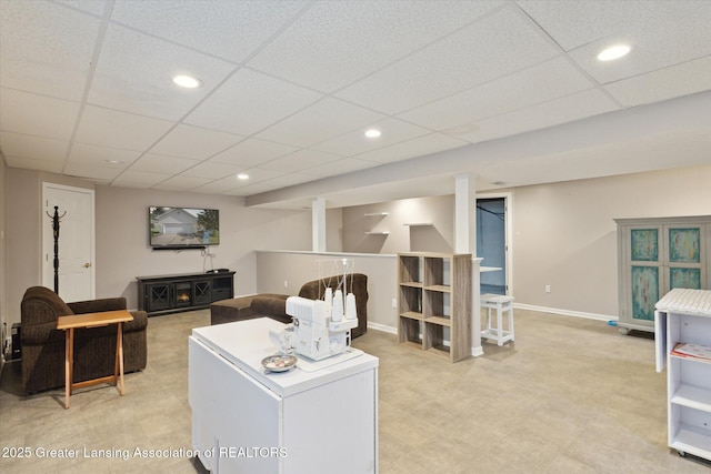 207 Queens Ct Unit 8, Grand Ledge, MI 48837 - living area with light colored carpet, a paneled ceiling, and recessed lighting