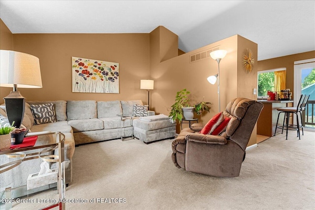 4538 Cranberry Ct, Lansing, MI 48917 - carpeted living room with lofted ceiling