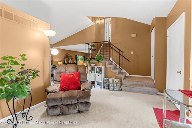 4538 Cranberry Ct, Lansing, MI 48917 - living room featuring carpet floors, lofted ceiling, and stairway