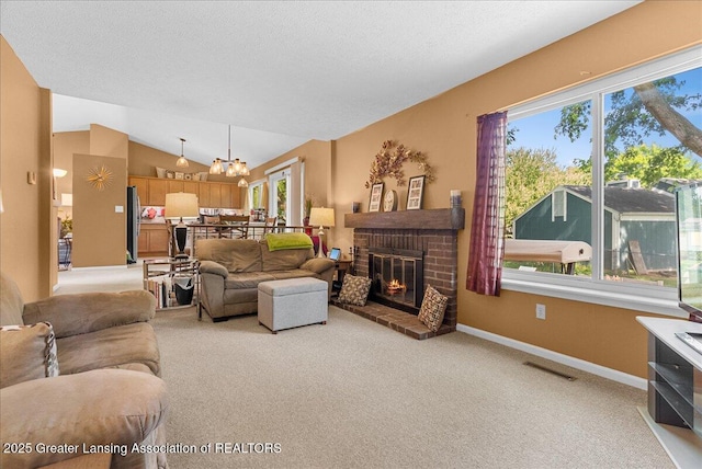4538 Cranberry Ct, Lansing, MI 48917 - living area featuring light carpet, lofted ceiling, a brick fireplace, and a textured ceiling