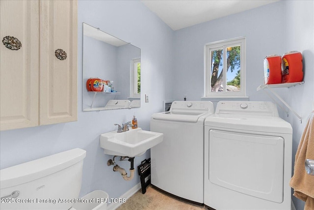 4538 Cranberry Ct, Lansing, MI 48917 - laundry area with washer and dryer