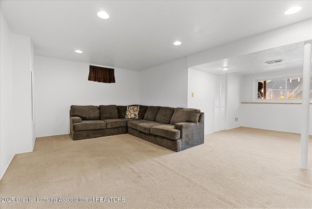 4538 Cranberry Ct, Lansing, MI 48917 - living room featuring carpet floors and recessed lighting