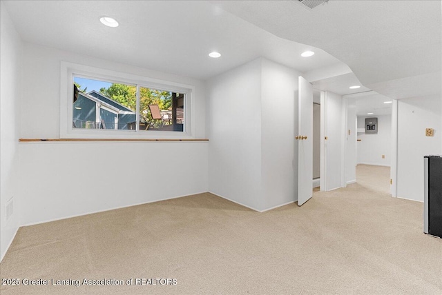 4538 Cranberry Ct, Lansing, MI 48917 - carpeted empty room with recessed lighting