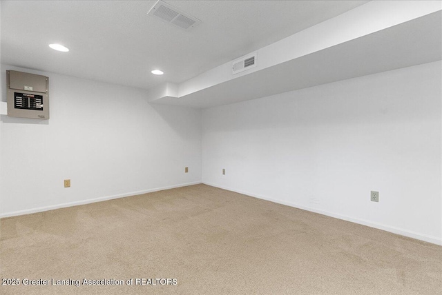 4538 Cranberry Ct, Lansing, MI 48917 - finished below grade area with light colored carpet and recessed lighting