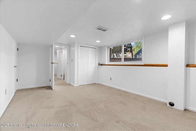 4538 Cranberry Ct, Lansing, MI 48917 - below grade area featuring carpet floors and recessed lighting