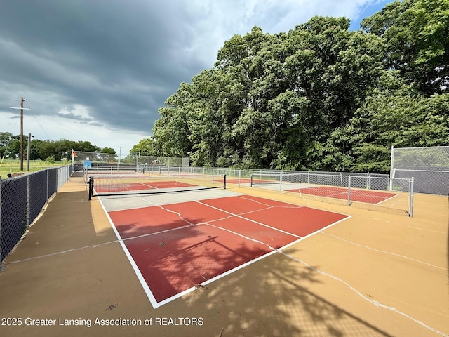 10993 Lakeside Dr, Perrinton, MI 48871 - view of tennis court with community basketball court