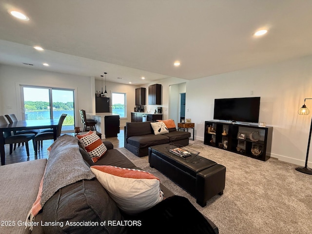 10993 Lakeside Dr, Perrinton, MI 48871 - living room with recessed lighting and light carpet