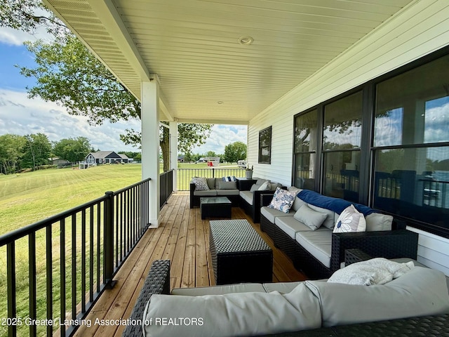 10993 Lakeside Dr, Perrinton, MI 48871 - deck with an outdoor hangout area and a yard