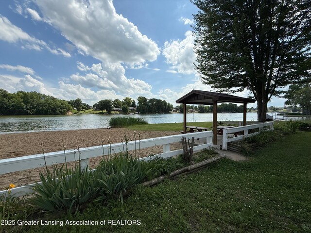 10993 Lakeside Dr, Perrinton, MI 48871 - dock area with a gazebo, a water view, and a yard