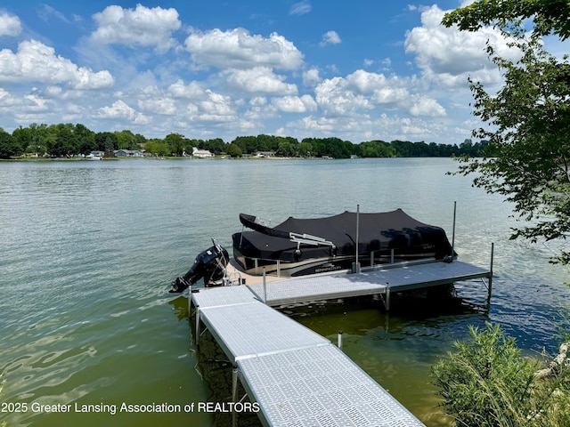 10993 Lakeside Dr, Perrinton, MI 48871 - dock area featuring boat lift and a water view