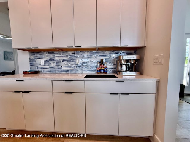 10993 Lakeside Dr, Perrinton, MI 48871 - bar with decorative backsplash