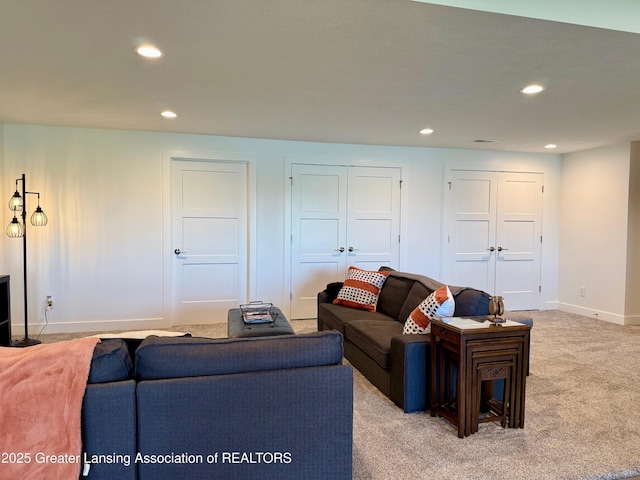 10993 Lakeside Dr, Perrinton, MI 48871 - living area featuring light carpet and recessed lighting