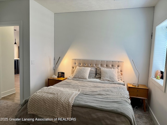 10993 Lakeside Dr, Perrinton, MI 48871 - bedroom with carpet flooring and beverage cooler
