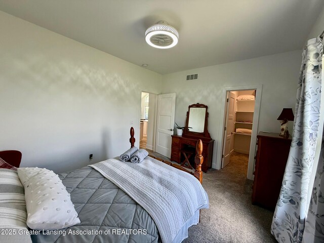 10993 Lakeside Dr, Perrinton, MI 48871 - carpeted bedroom featuring a spacious closet