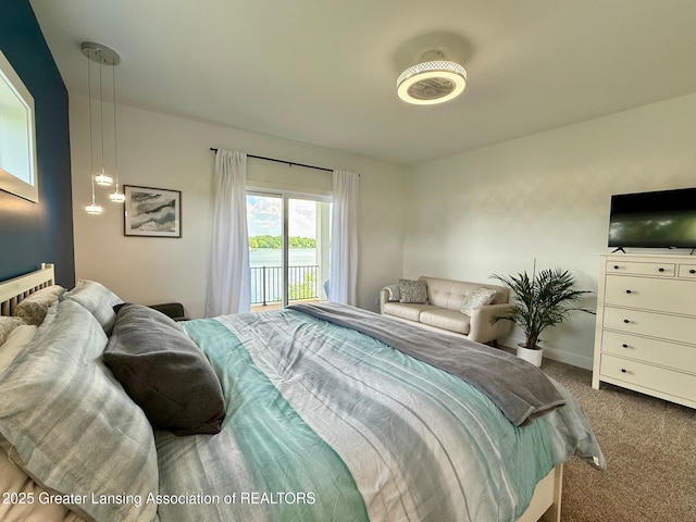 10993 Lakeside Dr, Perrinton, MI 48871 - bedroom featuring carpet flooring and access to exterior