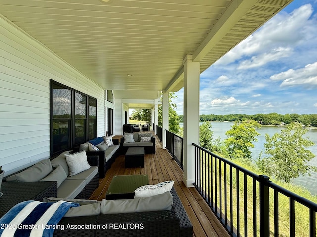 10993 Lakeside Dr, Perrinton, MI 48871 - wooden deck featuring an outdoor living space and a water view