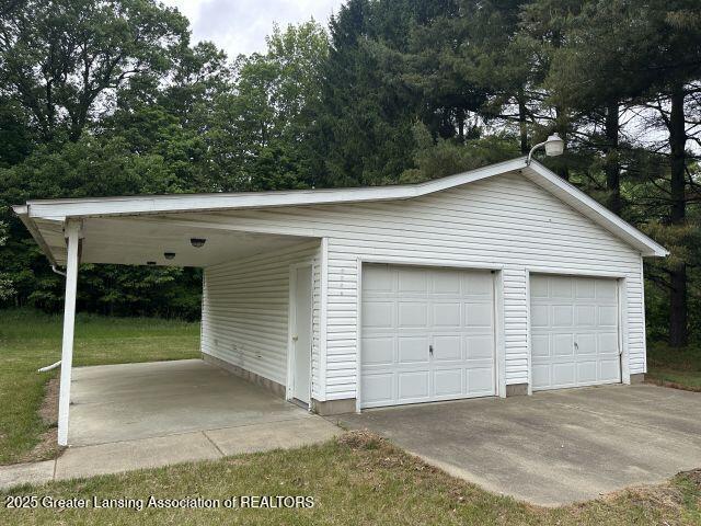 8241 Barson Rd, Rives Junction, MI 49277 - garage with a garage