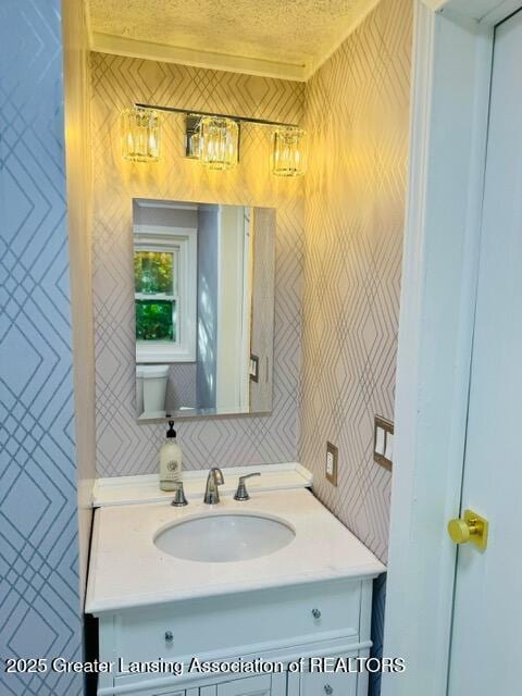4340 Balmoral Dr, Lansing, MI 48911 - bathroom with vanity and wallpapered walls