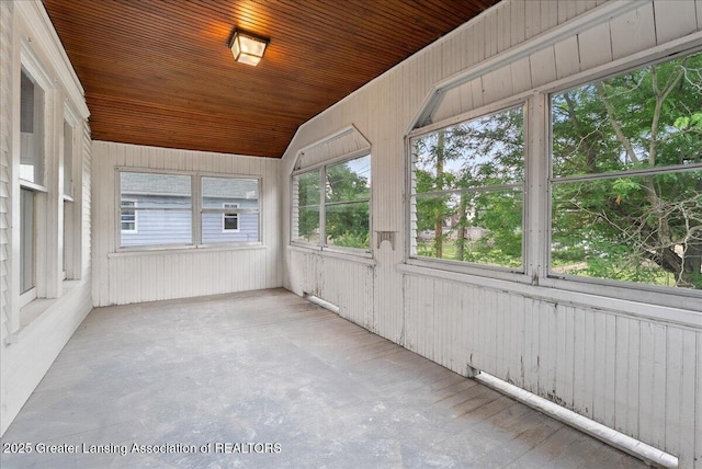 916 Wildwood Ave, Jackson, MI 49202 - unfurnished sunroom with lofted ceiling