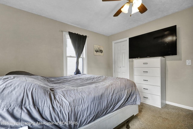2208 Washington Rd, Lansing, MI 48911 - bedroom with carpet floors, a closet, and ceiling fan
