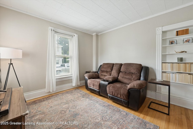 409 E Higham St, Saint Johns, MI 48879 - living area with crown molding and wood finished floors