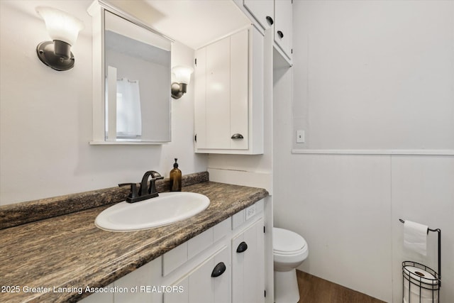 409 E Higham St, Saint Johns, MI 48879 - bathroom with vanity and wood finished floors