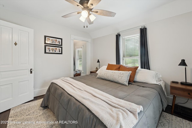 409 E Higham St, Saint Johns, MI 48879 - bedroom with light wood-type flooring and a ceiling fan