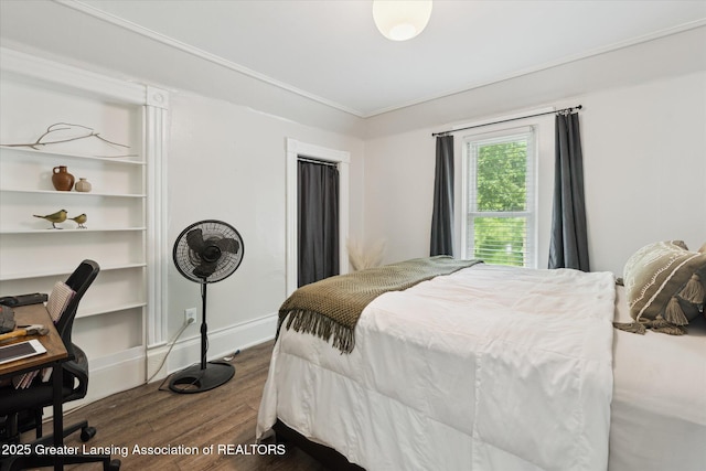 409 E Higham St, Saint Johns, MI 48879 - bedroom featuring wood finished floors and crown molding