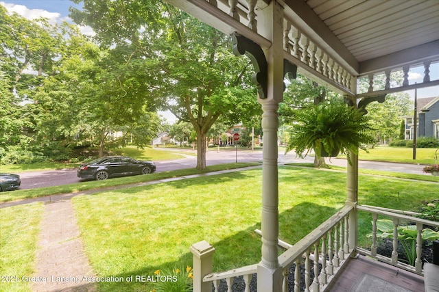 409 E Higham St, Saint Johns, MI 48879 - view of green lawn with covered porch