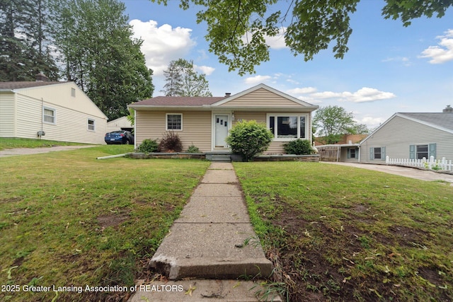 536 Hunter Blvd, Lansing, MI 48910 - view of front facade featuring a front lawn