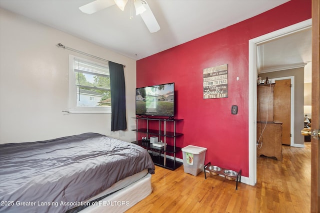 536 Hunter Blvd, Lansing, MI 48910 - bedroom featuring wood finished floors and ceiling fan