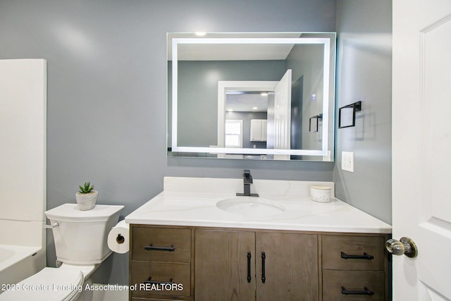 304 W Gibbs St, Saint Johns, MI 48879 - full bath featuring vanity and toilet