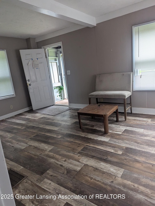 527 S Charles St, Lansing, MI 48912 - foyer entrance featuring wood finished floors and baseboards