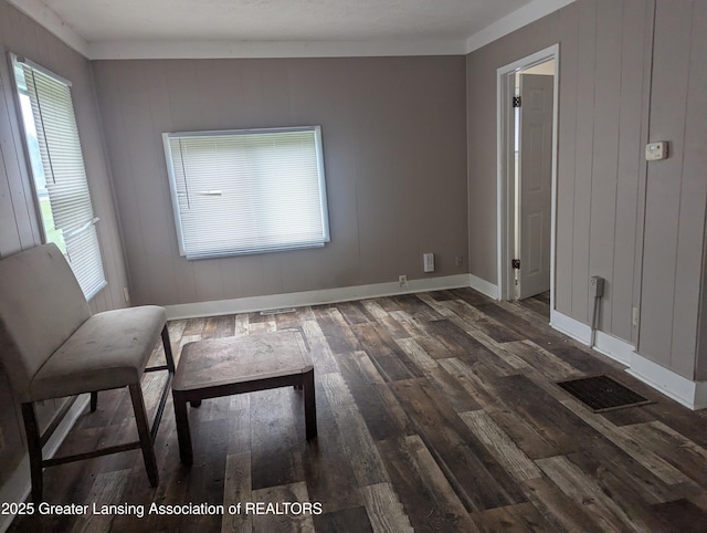 527 S Charles St, Lansing, MI 48912 - unfurnished room featuring hardwood / wood-style floors and baseboards