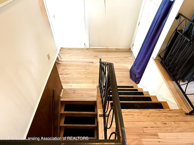 3618 Alpine Dr, Lansing, MI 48911 - stairs featuring wood finished floors