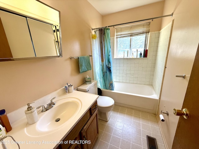 3618 Alpine Dr, Lansing, MI 48911 - bathroom featuring vanity and shower / tub combo with curtain