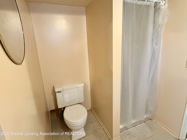 3618 Alpine Dr, Lansing, MI 48911 - full bathroom featuring curtained shower and marble look tile flooring