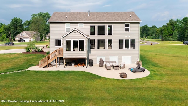 9655 Tobermory Dr, Haslett, MI 48840 - back of house featuring a lawn, an outdoor fire pit, and a patio