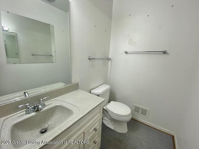 12906 Bilmar Ln, Grand Blanc, MI 48439 - half bath featuring toilet and vanity