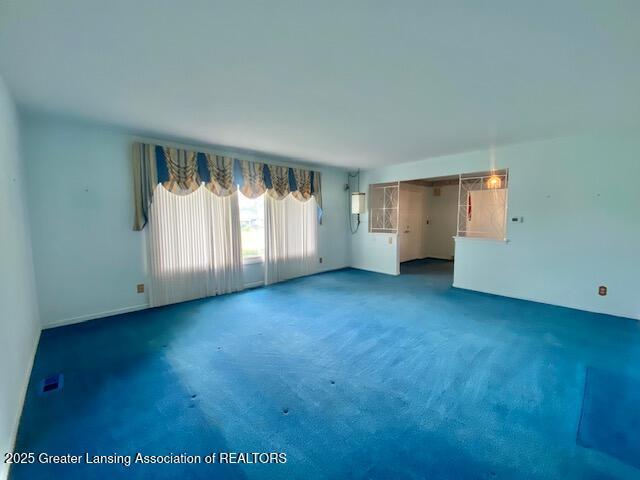 12906 Bilmar Ln, Grand Blanc, MI 48439 - spare room featuring carpet flooring
