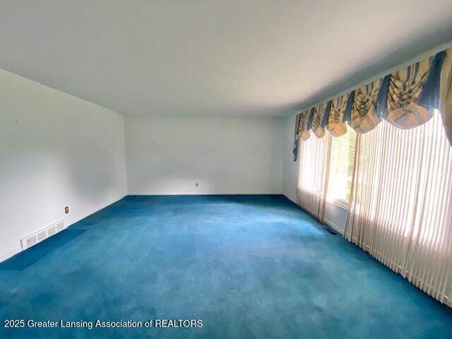 12906 Bilmar Ln, Grand Blanc, MI 48439 - carpeted spare room with baseboards