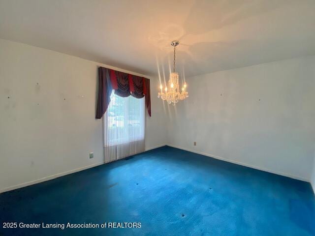 12906 Bilmar Ln, Grand Blanc, MI 48439 - empty room with a chandelier and carpet floors