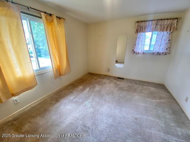 12906 Bilmar Ln, Grand Blanc, MI 48439 - carpeted spare room featuring plenty of natural light