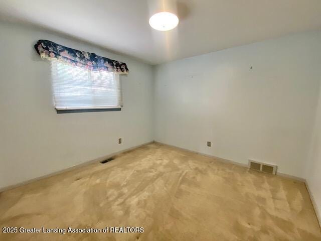 12906 Bilmar Ln, Grand Blanc, MI 48439 - unfurnished room with light colored carpet