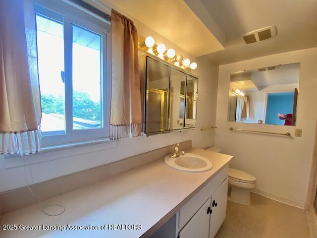 12906 Bilmar Ln, Grand Blanc, MI 48439 - full bathroom featuring healthy amount of natural light and vanity