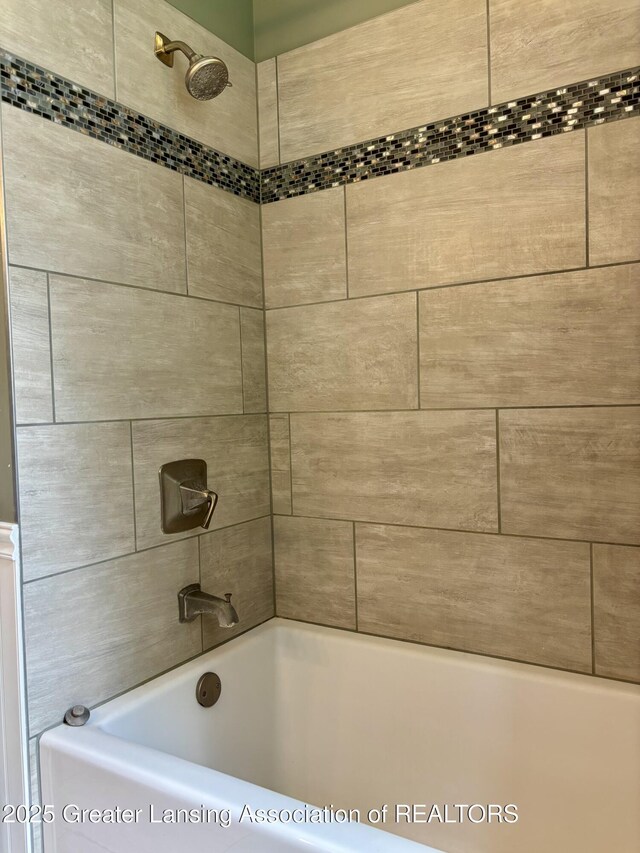 1023 E Colonial Park Dr, Grand Ledge, MI 48837 - full bath with washtub / shower combination