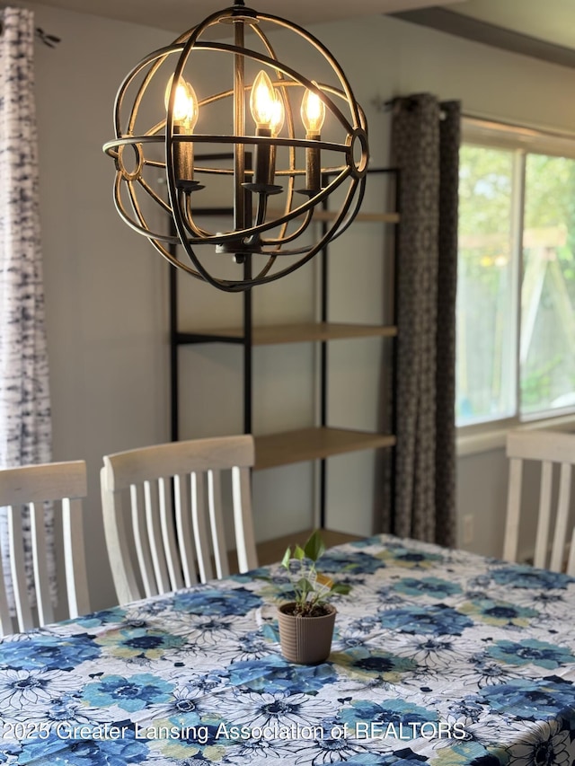 1023 E Colonial Park Dr, Grand Ledge, MI 48837 - dining room with a chandelier