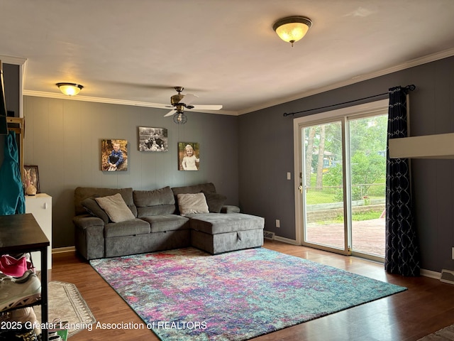 1023 E Colonial Park Dr, Grand Ledge, MI 48837 - living area featuring a ceiling fan, ornamental molding, and wood finished floors