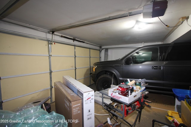 3231 Stonewood Dr, Lansing, MI 48912 - garage with a garage door opener